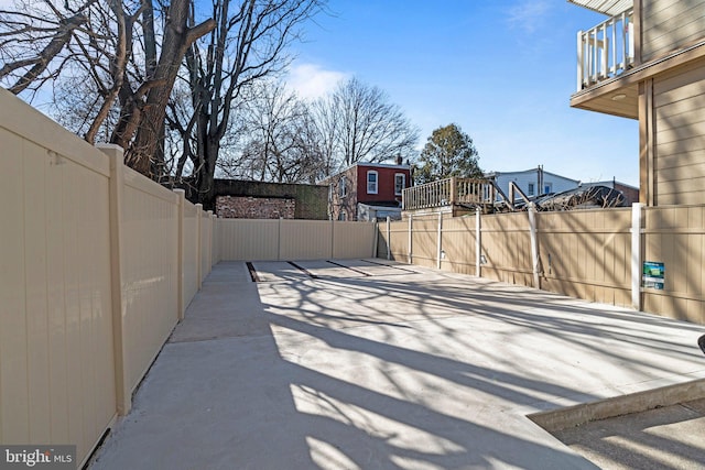 view of patio / terrace featuring fence