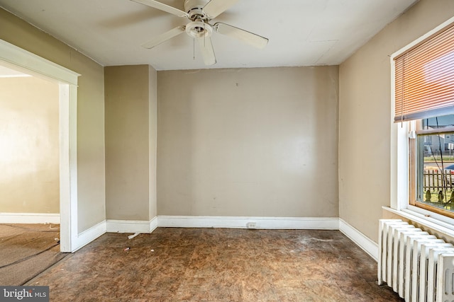 1121 E 22nd St, Wilmington, DE 19802 - empty room featuring baseboards, a ceiling fan, and radiator heating unit