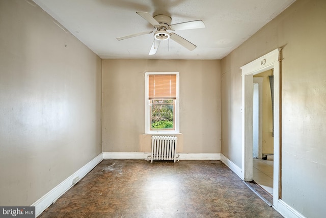 1121 E 22nd St, Wilmington, DE 19802 - empty room featuring baseboards, a ceiling fan, and radiator