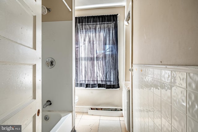 1121 E 22nd St, Wilmington, DE 19802 - full bath featuring shower / bathtub combination, tile patterned flooring, and toilet