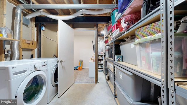 laundry area featuring laundry area and washer and clothes dryer