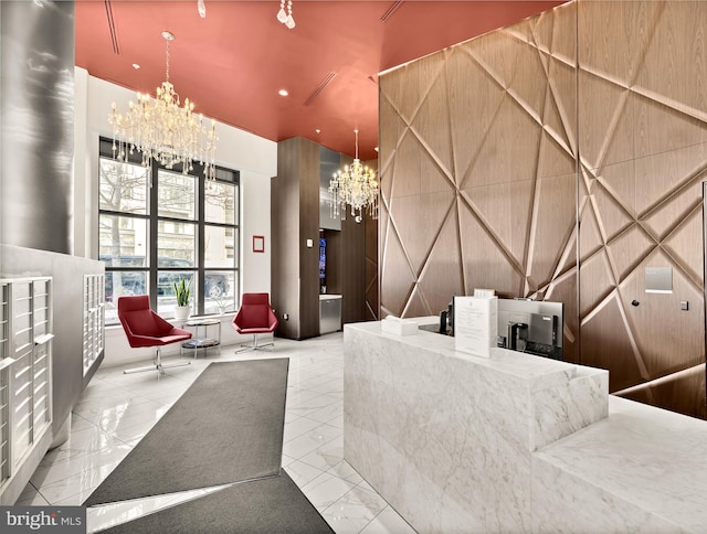 reception area with an inviting chandelier