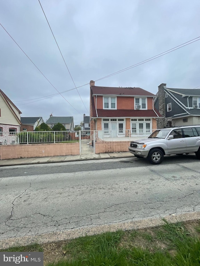 27 Wellington Rd, Upper Darby, PA 19082 - view of front facade featuring a fenced front yard