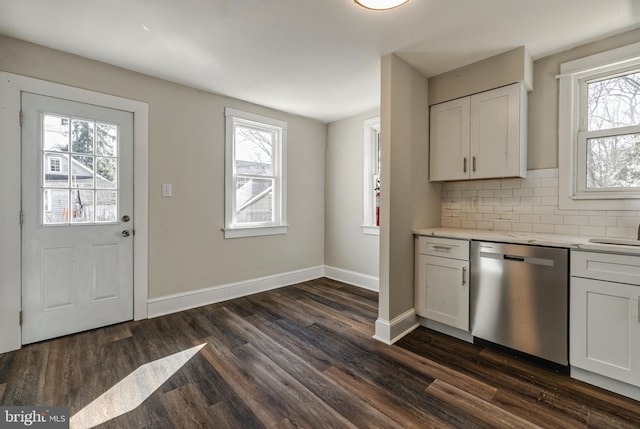 kitchen with backsplash, dishwasher, dark wood-style floors, and a healthy amount of sunlight