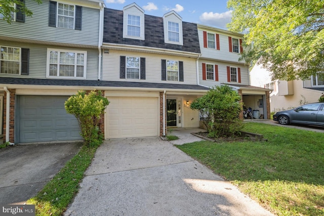 multi unit property featuring a front yard, roof with shingles, concrete driveway, a garage, and brick siding