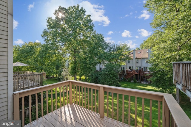 deck featuring a yard