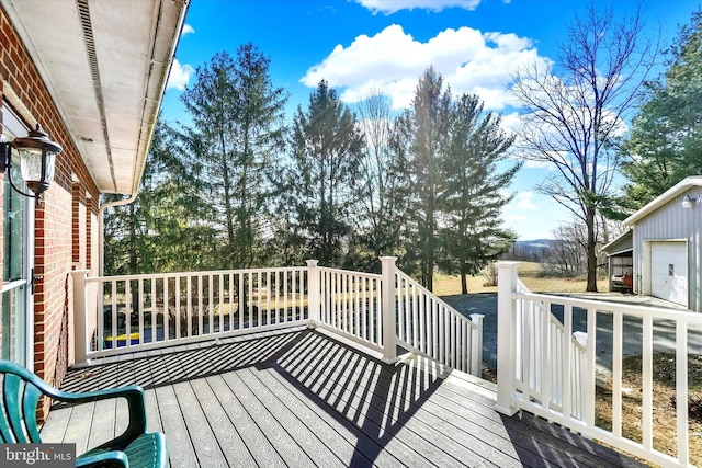 wooden terrace featuring a garage