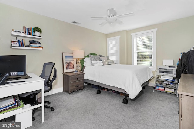 bedroom featuring visible vents, baseboards, ceiling fan, and carpet floors