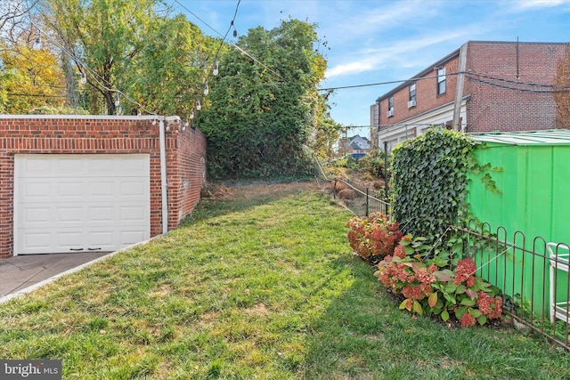 view of yard with an outdoor structure and fence