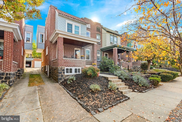 view of front of home featuring brick siding