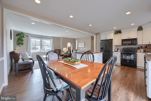 dining area with recessed lighting and dark wood-style flooring