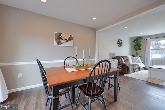 dining room featuring recessed lighting, baseboards, and wood finished floors