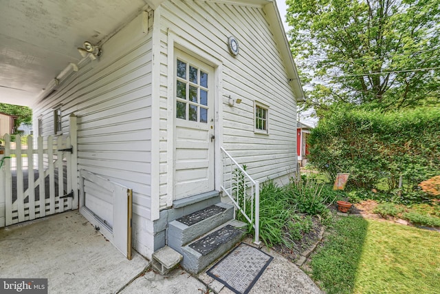 view of home's exterior with entry steps