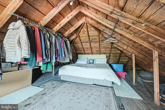 unfurnished bedroom featuring wood finished floors, lofted ceiling, and wooden ceiling