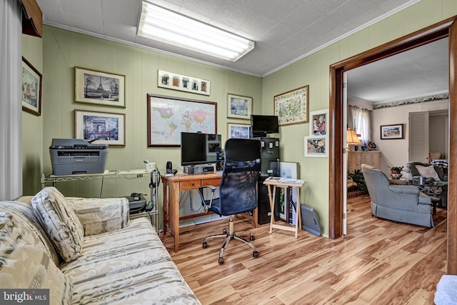 office area featuring crown molding and wood finished floors