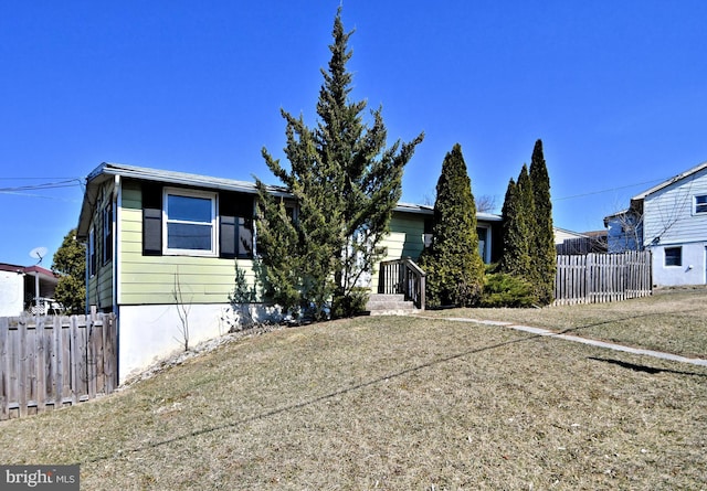 view of front of property with fence