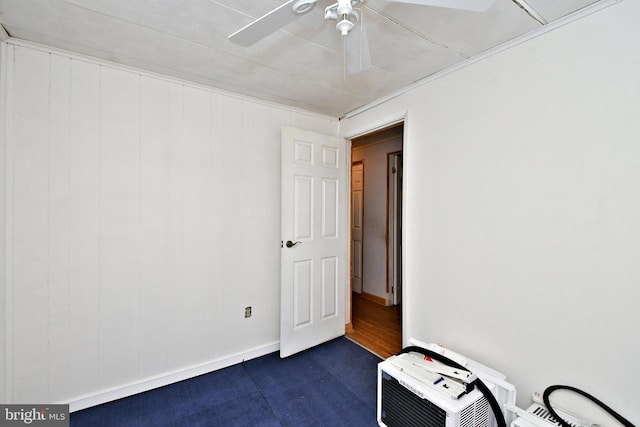 unfurnished room featuring a ceiling fan