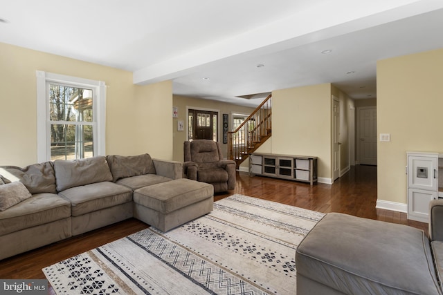 living area with recessed lighting, stairs, baseboards, and wood finished floors