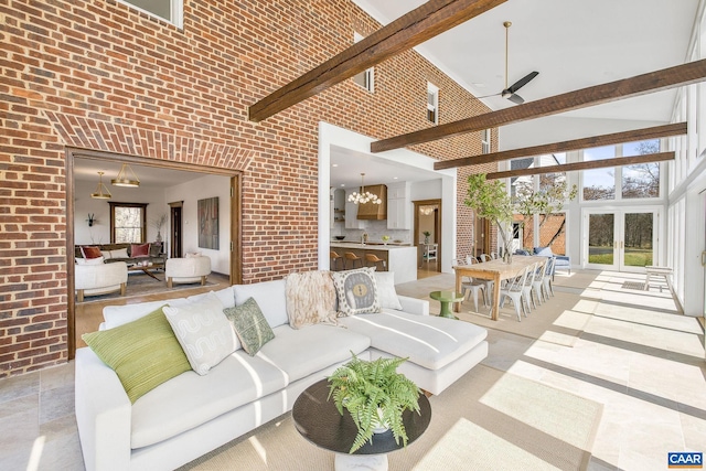 view of patio / terrace featuring french doors, outdoor dining area, area for grilling, and outdoor lounge area