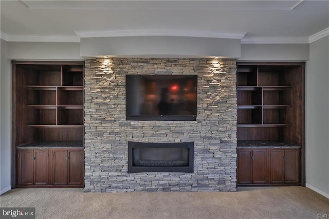 unfurnished living room with baseboards, carpet, and ornamental molding