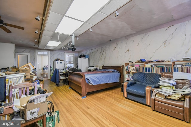 bedroom featuring wood finished floors