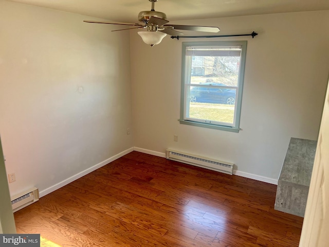 spare room featuring wood finished floors, baseboards, a baseboard radiator, ceiling fan, and a baseboard heating unit