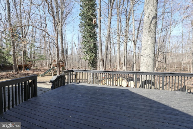 wooden deck with a playground