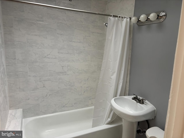 full bath featuring shower / bathtub combination with curtain