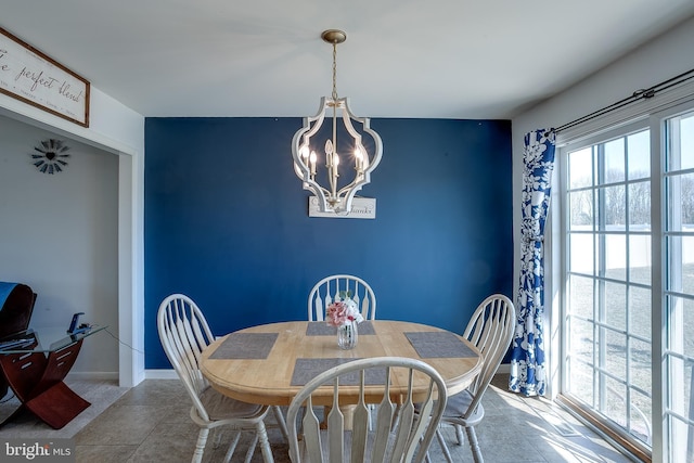 1107 Liberty Ave, Vineland, NJ 08360 - dining space with a notable chandelier and baseboards