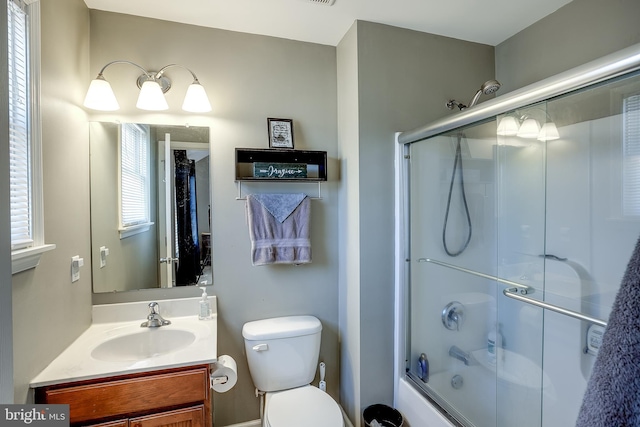 1107 Liberty Ave, Vineland, NJ 08360 - full bathroom with vanity, toilet, and enclosed tub / shower combo