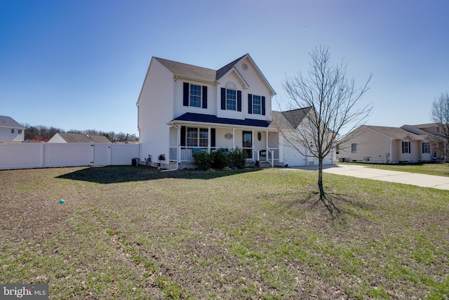 1107 Liberty Ave, Vineland, NJ 08360 - traditional-style house with fence, a front yard, covered porch, a garage, and driveway