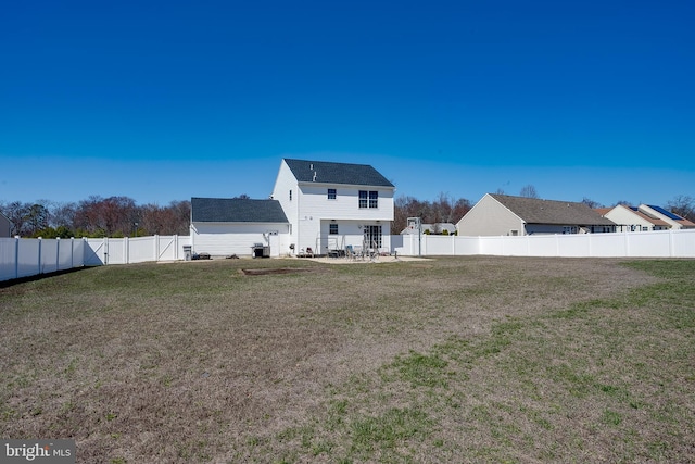 1107 Liberty Ave, Vineland, NJ 08360 - rear view of house featuring a patio area, a yard, and a fenced backyard
