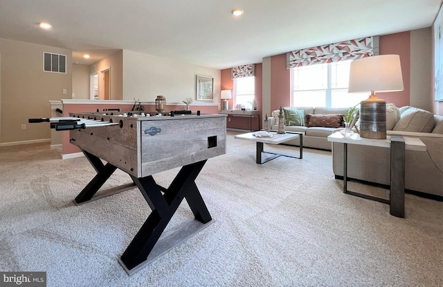 rec room with recessed lighting, visible vents, baseboards, and light colored carpet