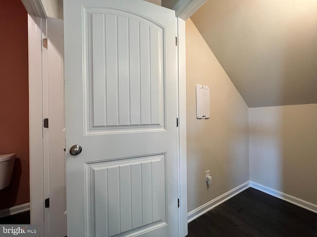 details featuring baseboards and wood finished floors