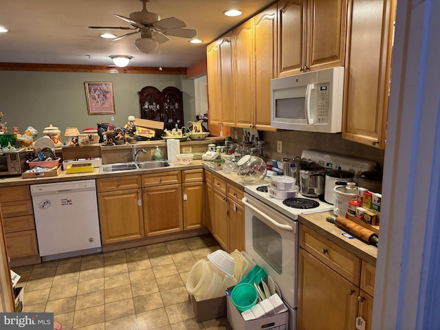 kitchen with ceiling fan, light countertops, recessed lighting, white appliances, and a sink