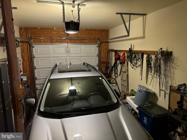 garage featuring a garage door opener