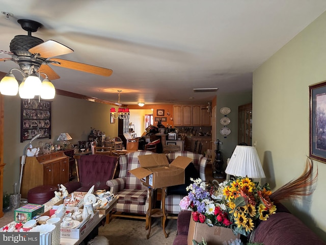 living room with a ceiling fan