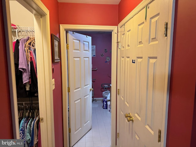 hallway with light tile patterned flooring