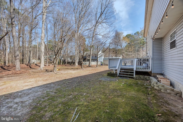 view of yard with a deck