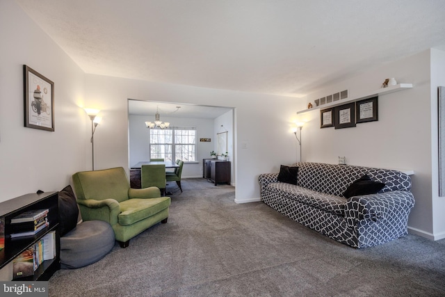 carpeted living room with a notable chandelier, visible vents, and baseboards