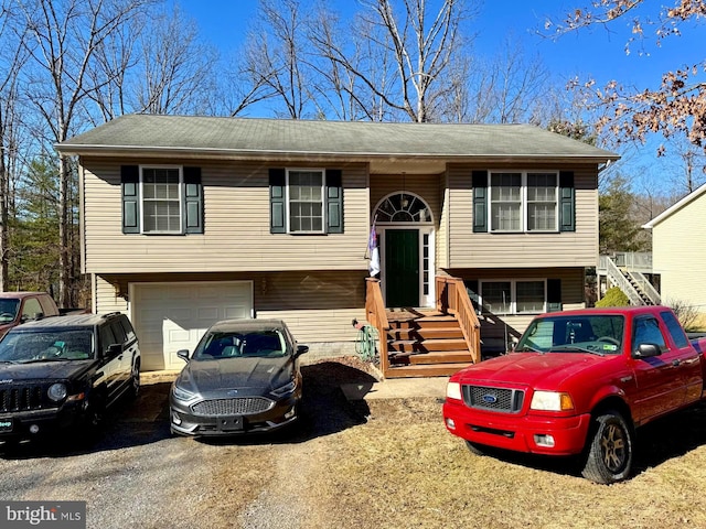 bi-level home featuring a garage