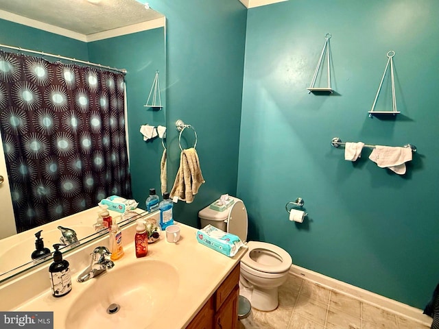bathroom featuring vanity, toilet, a shower with curtain, and baseboards