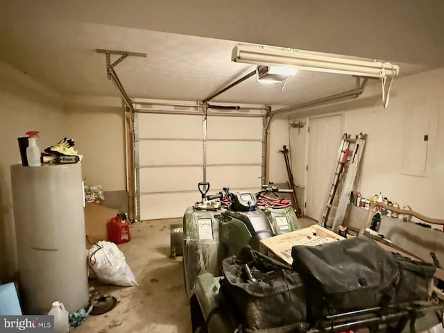 garage with gas water heater, electric panel, and a garage door opener