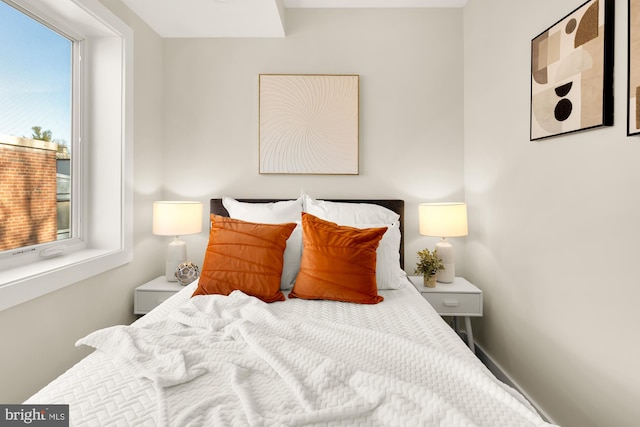 bedroom featuring baseboards