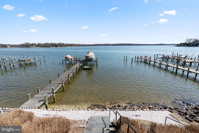 view of dock featuring a water view and boat lift