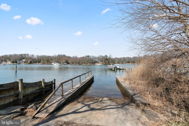 view of dock with a water view