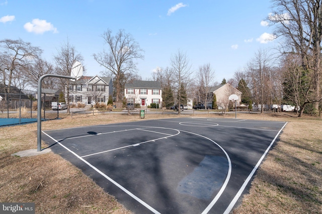 view of sport court with community basketball court and fence