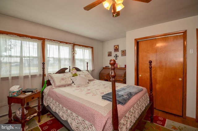 bedroom with a closet and a ceiling fan