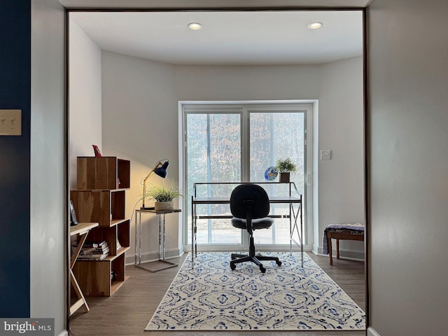 office area with recessed lighting, baseboards, and wood finished floors