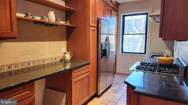 kitchen featuring a sink, open shelves, backsplash, ventilation hood, and stainless steel fridge with ice dispenser